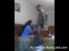 One sexy guy's big, dark rod is sucked by a sultry Latina lover.